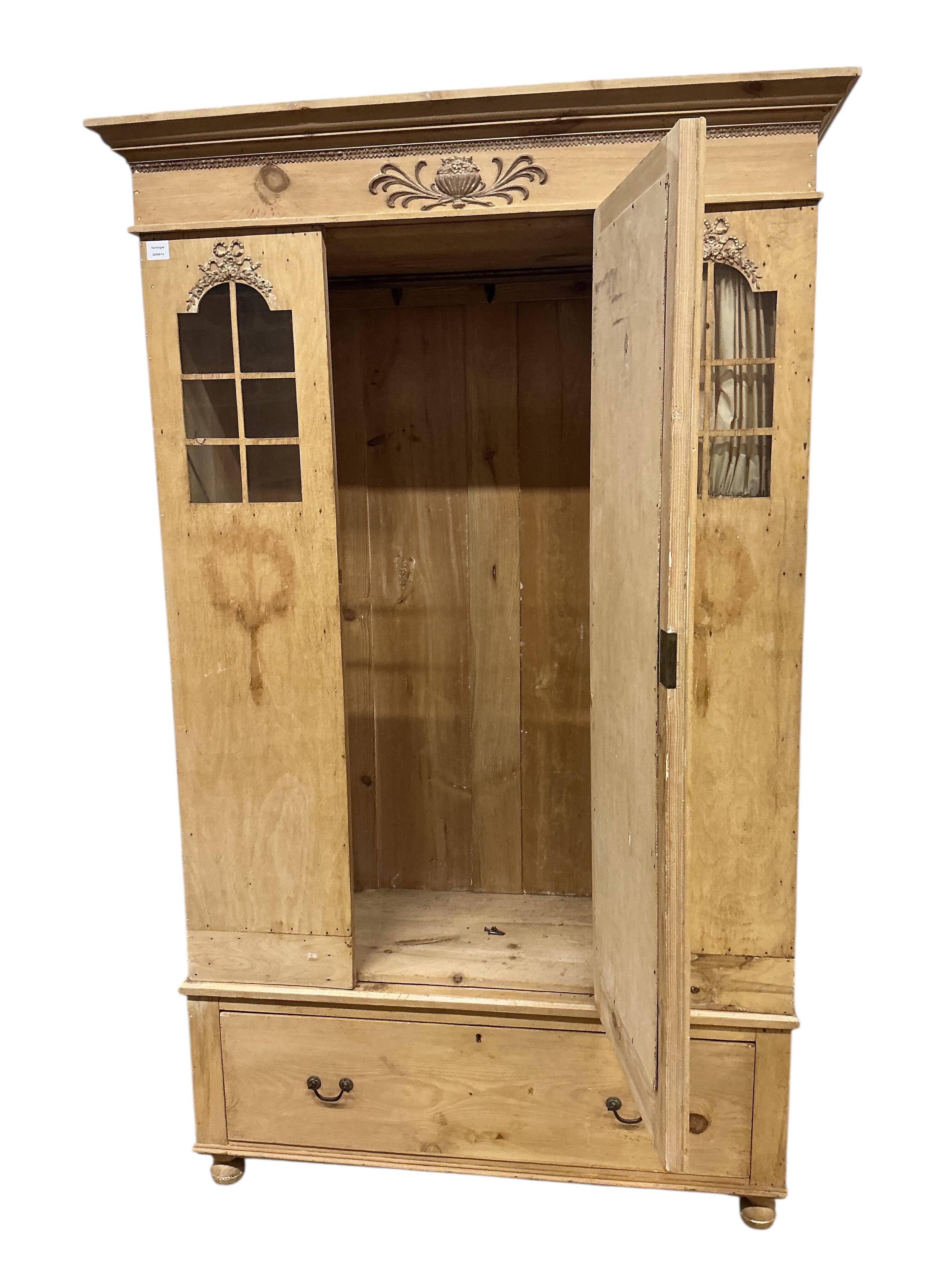 A late 19th century Continental pine wardrobe, width 124cm, depth 51cm, height 200cm